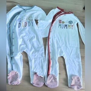 2  White Baby Onesies . New never worn before just took the tags off.